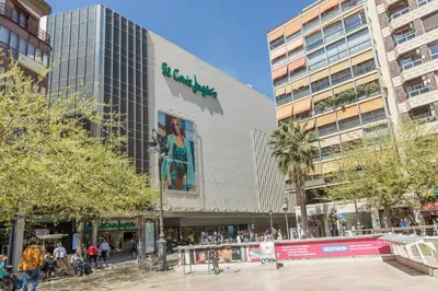 a group of people walking in front of a building at Loft con terraza centro Valencia in Valencia