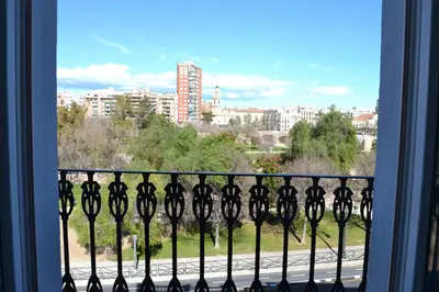 a view of a city from a balcony at Blanq Carmen Hotel in Valencia