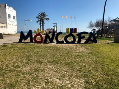 a sign that says mongolia in a park at FeWo - Moncofa Apartment in Moncófar