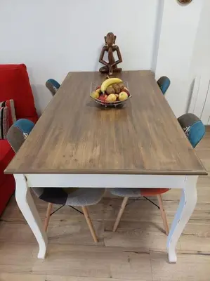 a wooden table with a bowl of fruit on it at Family Apartment Andrea in Alaquas