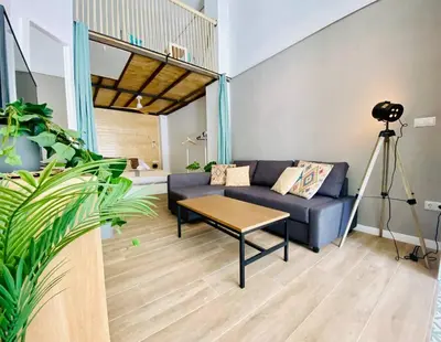 a living room with a couch and a table at B1 Verdeguer - Flat close to the Beach in Valencia