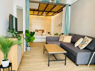 a living room with a couch and a table at B1 Verdeguer - Flat close to the Beach in Valencia