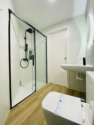 a bathroom with a shower and a toilet and a sink at B1 Verdeguer - Flat close to the Beach in Valencia