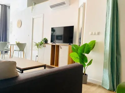 a living room with a couch and a table at B1 Verdeguer - Flat close to the Beach in Valencia