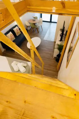 an overhead view of a living room and a dining room at B2 Verdeguer - Cozy Loft close to the beach in Valencia