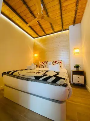 a bedroom with a large bed in a room at B3 Verdeguer - Cozy Loft Close to the Beach in Valencia