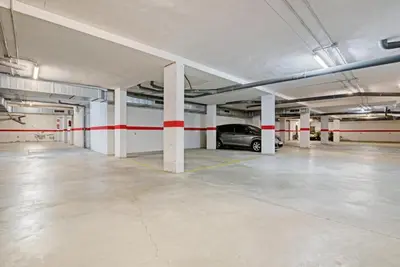 an empty parking garage with a car parked in it at Sagunto - Albalat de Tarongers - Estivella - Gilet in Albalat de Taronchers