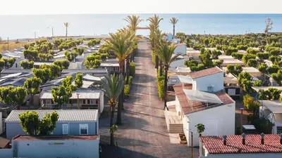 an aerial view of houses and the ocean at HolaCamp Chilches in Xilxes