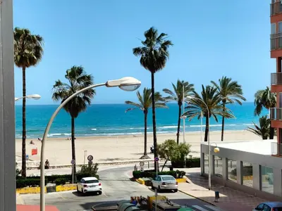 a view of the beach from a building at Sea view apartment in Cullera