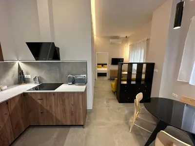 a kitchen with a sink and a counter at Industrial Style Ruzafa in Valencia