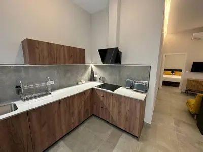 a kitchen with a sink and a counter top at Industrial Style Ruzafa in Valencia