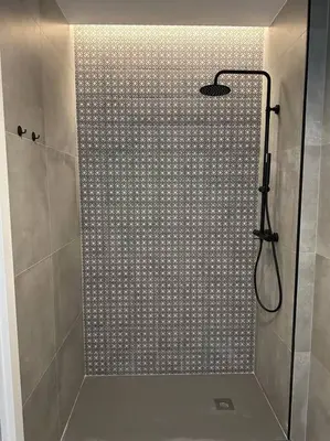 a shower with a glass door with a shower at Industrial Style Ruzafa in Valencia