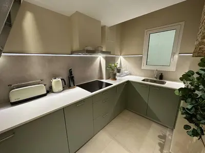 a kitchen with a sink and a counter top at Bali style Ruzafa in Valencia