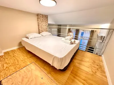 a bedroom with a large bed in a room at Bali style Ruzafa in Valencia
