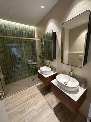 a bathroom with two sinks and a shower at Bali style Ruzafa in Valencia