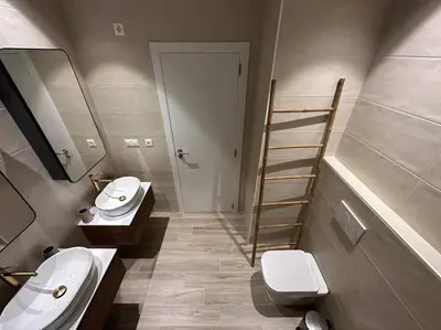 a bathroom with a sink and a toilet and a ladder at Bali style Ruzafa in Valencia